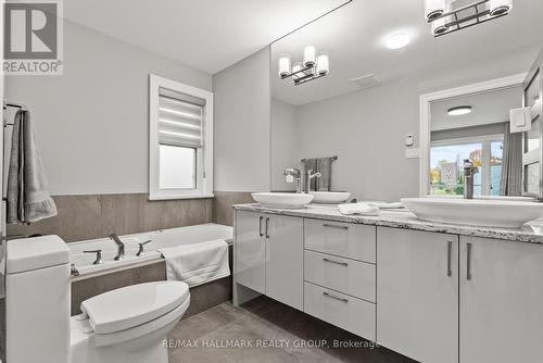 Spacious ENSUITE BATHROOM with double sinks. - 217 Belford Crescent, Ottawa, ON - Indoor Photo Showing Bathroom