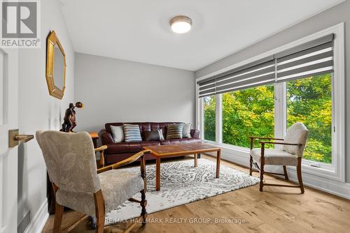 3rd BEDROOM with view of greenery! - 217 Belford Crescent, Ottawa, ON - Indoor Photo Showing Living Room