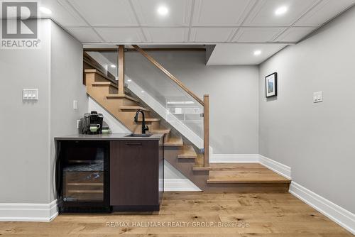 WET BAR and WINE FRIDGE in basement. - 217 Belford Crescent, Ottawa, ON - Indoor Photo Showing Other Room