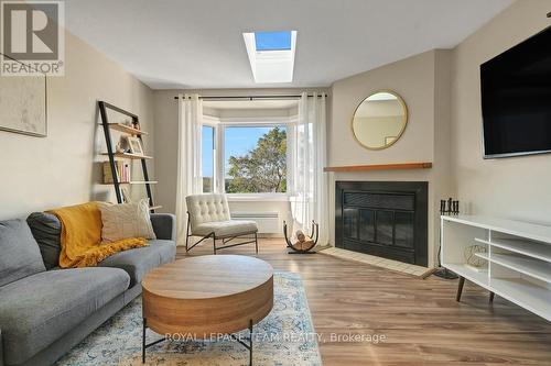 2 - 2 Stonebank Crescent, Ottawa, ON - Indoor Photo Showing Living Room With Fireplace