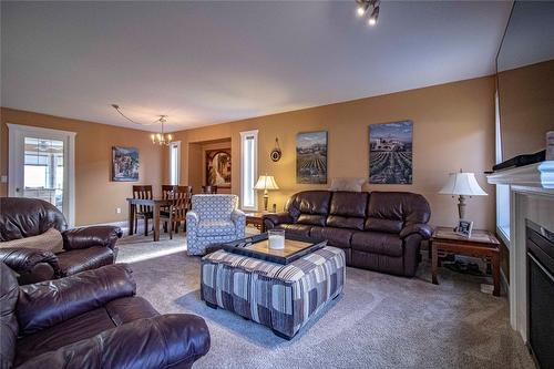 454 Ridge Place, Penticton, BC - Indoor Photo Showing Living Room With Fireplace