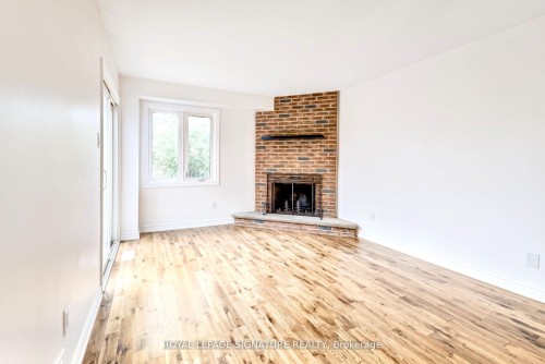 36 Denlow Drive, Brampton, ON - Indoor Photo Showing Living Room With Fireplace