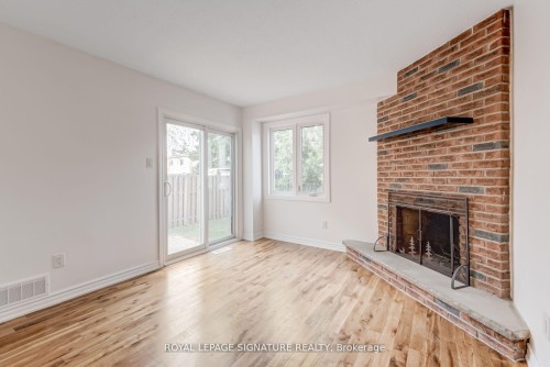36 Denlow Drive, Brampton, ON - Indoor Photo Showing Living Room With Fireplace