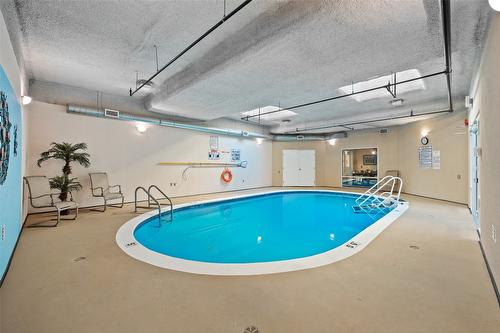 104-1966 Durnin Road, Kelowna, BC - Indoor Photo Showing Other Room With In Ground Pool