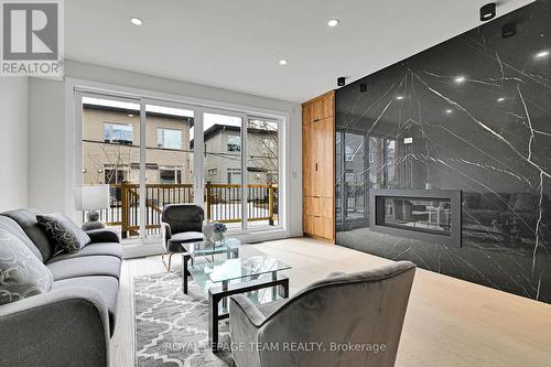 Gas fireplace w/ natural stone finish - 826 Alpine Avenue, Ottawa, ON - Indoor