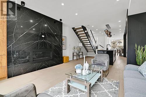826 Alpine Avenue, Ottawa, ON - Indoor Photo Showing Living Room With Fireplace