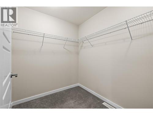 Primary walk-in closet - 680 Old Meadows Road Unit# 86, Kelowna, BC - Indoor With Storage
