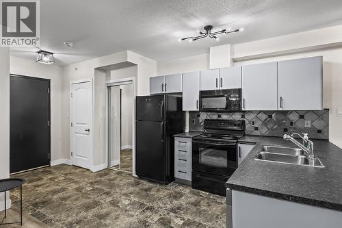 140 Asher Road Unit# 412, Kelowna, BC - Indoor Photo Showing Kitchen With Double Sink