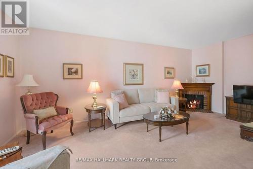 625 Trelawny Private, Ottawa, ON - Indoor Photo Showing Living Room With Fireplace
