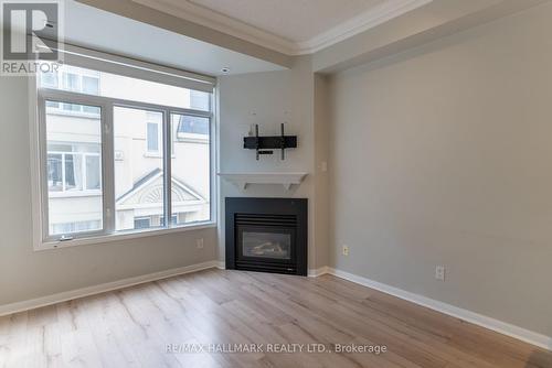 278 - 30 Stadium Road, Toronto, ON - Indoor Photo Showing Living Room With Fireplace