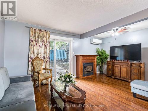 11 Hector Court, Brampton, ON - Indoor Photo Showing Living Room With Fireplace
