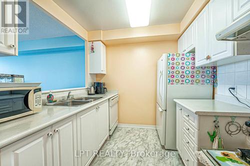 1003 - 5001 Finch Avenue E, Toronto, ON - Indoor Photo Showing Kitchen With Double Sink