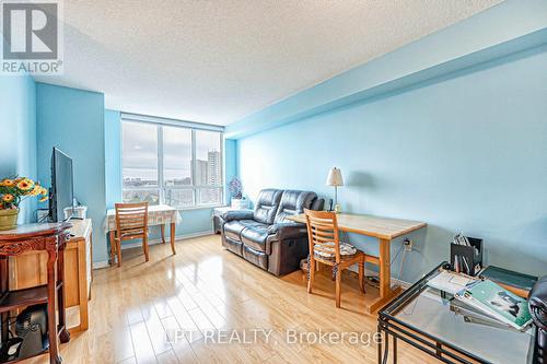 1003 - 5001 Finch Avenue E, Toronto, ON - Indoor Photo Showing Living Room
