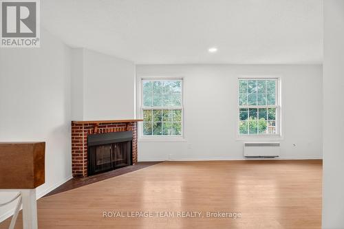 9 Moorside Private, Ottawa, ON - Indoor With Fireplace