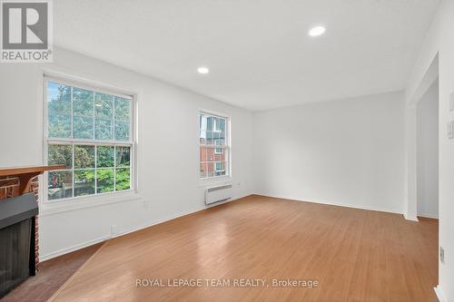 9 Moorside Private, Ottawa, ON - Indoor Photo Showing Other Room With Fireplace