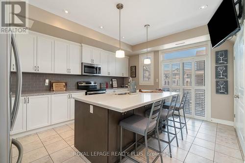 28 - 4143 Palermo Common, Burlington, ON - Indoor Photo Showing Kitchen With Upgraded Kitchen