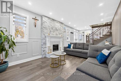4174 Trellis Crescent, Mississauga, ON - Indoor Photo Showing Living Room With Fireplace