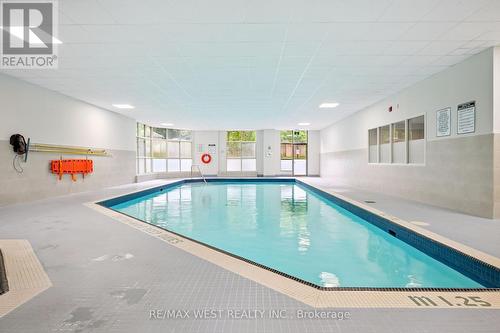 241 - 8351 Mclaughlin Road S, Brampton, ON - Indoor Photo Showing Other Room With In Ground Pool