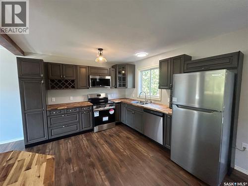 232 2Nd Street, Frobisher, SK - Indoor Photo Showing Kitchen With Double Sink