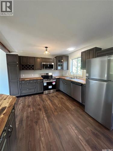 232 2Nd Street, Frobisher, SK - Indoor Photo Showing Kitchen With Double Sink
