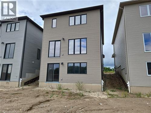 Rear view of house - 261 Benninger Drive Unit# Upper, Kitchener, ON - Outdoor With Exterior