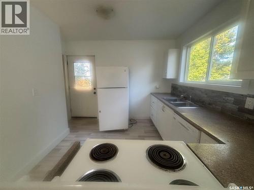 220 Stovel Avenue E, Melfort, SK - Indoor Photo Showing Kitchen With Double Sink