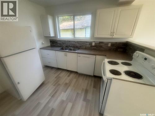 220 Stovel Avenue E, Melfort, SK - Indoor Photo Showing Kitchen With Double Sink