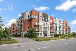 404-335 Boul. Marcel-Laurin  Montréal (Saint-Laurent), QC H4M 0A7