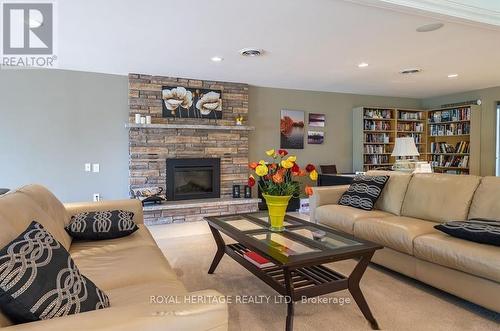 405 - 200 East Street S, Kawartha Lakes (Bobcaygeon), ON - Indoor Photo Showing Living Room With Fireplace