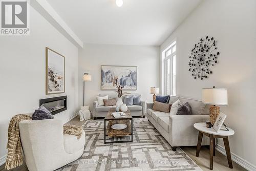 884 Plum Place, Milton, ON - Indoor Photo Showing Living Room With Fireplace