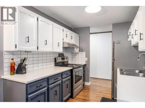 Furniture now removed - 555 Rowcliffe Avenue Unit# 307, Kelowna, BC - Indoor Photo Showing Kitchen With Double Sink