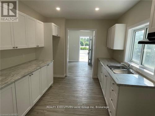 4319 Highway 11 N, North Bay (College Heights), ON - Indoor Photo Showing Kitchen With Double Sink