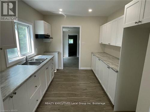 4319 Highway 11 N, North Bay (College Heights), ON - Indoor Photo Showing Kitchen With Double Sink