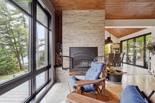 Cuisine - 2 Route 329, Gore, QC - Indoor Photo Showing Living Room With Fireplace