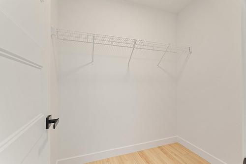 Chambre à coucher principale - 2 Rue De L'Oural, Sainte-Brigitte-De-Laval, QC - Indoor With Storage