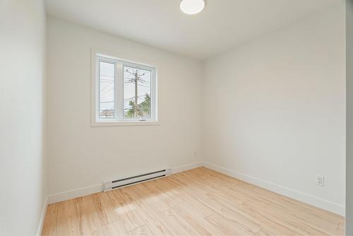 Chambre à coucher - 2 Rue De L'Oural, Sainte-Brigitte-De-Laval, QC - Indoor Photo Showing Other Room