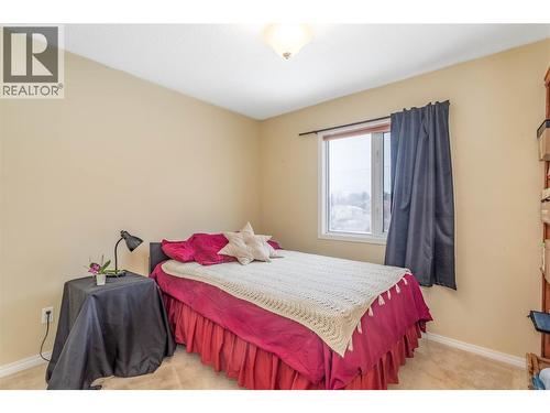 1125 Keyes Road, Kelowna, BC - Indoor Photo Showing Bedroom