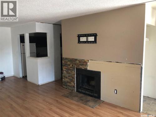 162 160 Gore Place, Regina, SK - Indoor Photo Showing Living Room With Fireplace