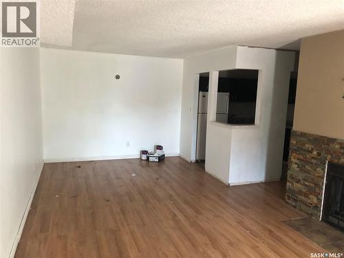 162 160 Gore Place, Regina, SK - Indoor With Fireplace