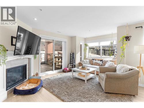 3362 Skaha Lake Road Unit# 307, Penticton, BC - Indoor Photo Showing Living Room With Fireplace
