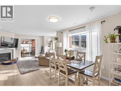 3362 Skaha Lake Road Unit# 307, Penticton, BC - Indoor Photo Showing Dining Room With Fireplace
