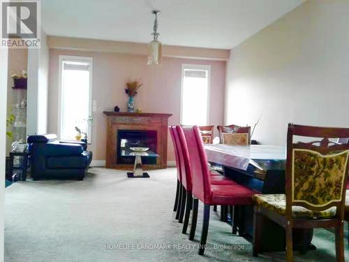 212 Westfield Place, Waterloo, ON - Indoor Photo Showing Dining Room With Fireplace