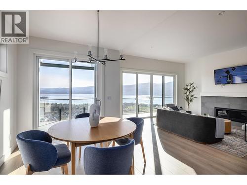 **Showhome photos - Actual home may differ in design, finishes, and features** - 4075 Sunstone Street, West Kelowna, BC - Indoor Photo Showing Dining Room