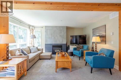 5423 Boomerang Way Unit# 19, Fernie, BC - Indoor Photo Showing Living Room With Fireplace