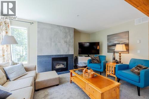 5423 Boomerang Way Unit# 19, Fernie, BC - Indoor Photo Showing Living Room With Fireplace