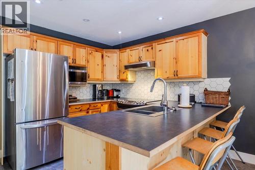 5423 Boomerang Way Unit# 19, Fernie, BC - Indoor Photo Showing Kitchen With Double Sink