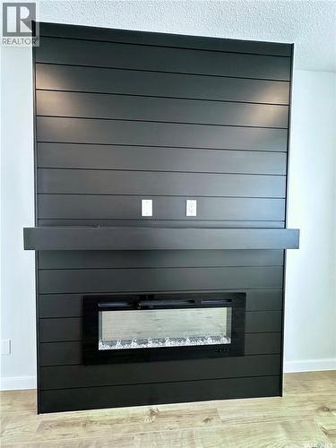2953 Bellegarde Crescent, Regina, SK - Indoor With Fireplace
