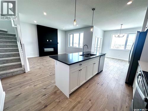 2953 Bellegarde Crescent, Regina, SK - Indoor Photo Showing Kitchen With Double Sink
