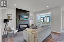 2953 Bellegarde Crescent, Regina, SK  - Indoor Photo Showing Living Room With Fireplace 