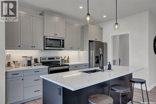 2953 Bellegarde Crescent, Regina, SK - Indoor Photo Showing Kitchen With Double Sink With Upgraded Kitchen